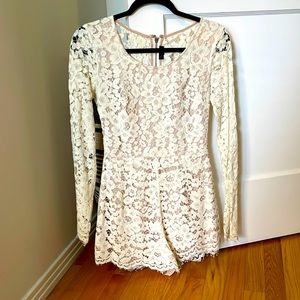 Cream lace, nude lined, long-sleeve romper. Super flattering fit!